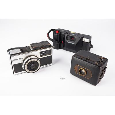 Zeiss Ikon Baby Box and Ikomatic F Cameras and a Pentax PC 35 Winder Camera