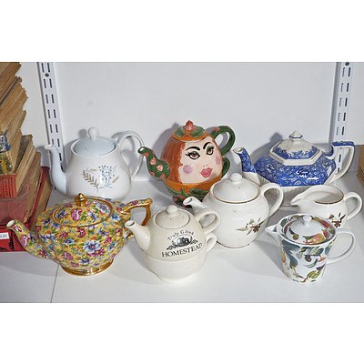 Seven Vintage Teapots and Creamer Jug