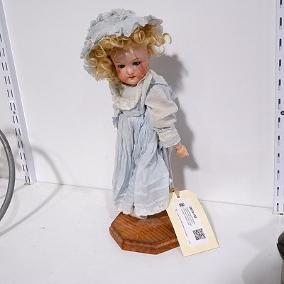 Antique Heubach Koppelsdorf Germany Doll 250-7/0 with Porcelain Head and Composite Body on Wooden Stand