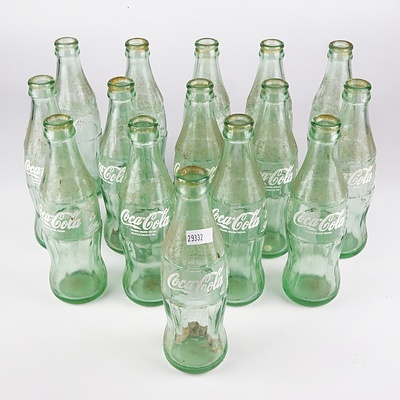 Fifteen 237 ml Coca Cola Bottles - No Contents