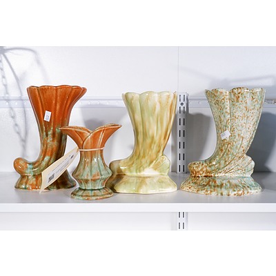 Three Diana Pottery Horn Vases and another Small Vase