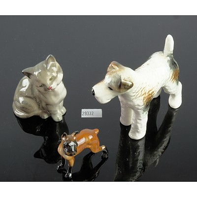Royal Doulton Sitting Cat and Boxer Dog Figurines and a Bretby Dog