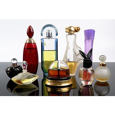 Assortment of Partially Used Perfume Bottles including Jean Paul Gaultier and Givenchy