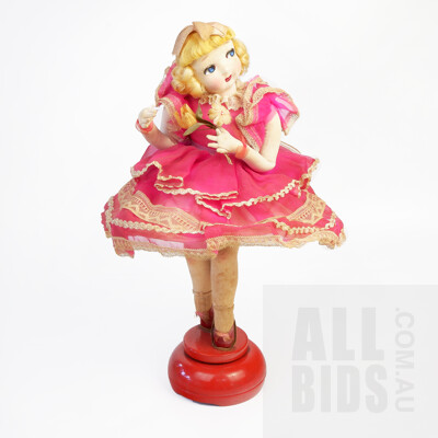 Large Eyes Fabric Boudoir Doll with Wired Skirt Atop a Music Box