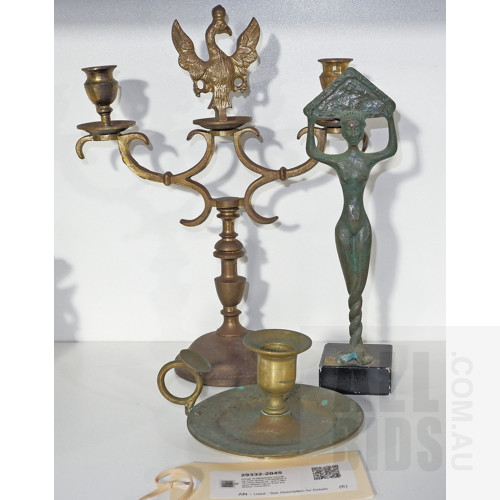 Group of Metalware Including Cast Brass Candelabra and Chamberstick, and a Bronzed Metal Figure from the Museo Guarnacci