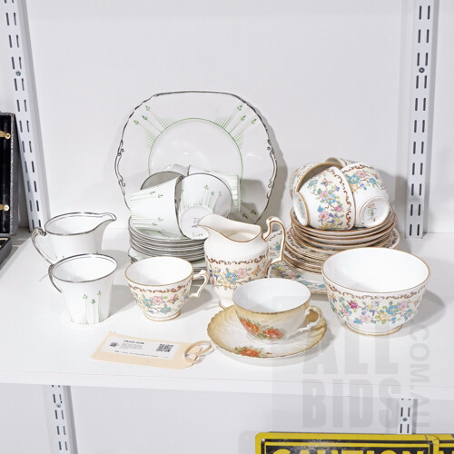 Part Porcelain Tea Sets Including Crown Staffordshire Bone China, Roslyn China, and One Continental Cup and Saucer
