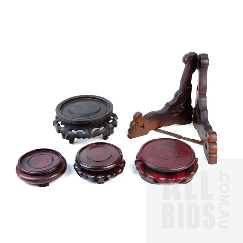 Four Vintage Chinese Carved Hardwood Vase Stands, and a Pierced and Hinged Plate Stand (5)