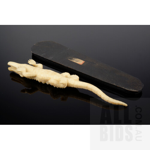1950's Japanese Faux Ivory Carving of a Crocodile on Original Black Stained Hardwood Stand, Length 21cm