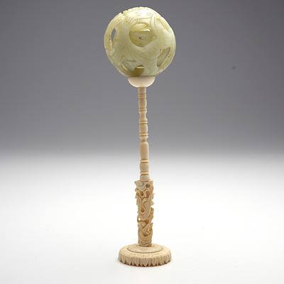 Antique Chinese Carved Serpentine Puzzle Ball on Ivory Stand