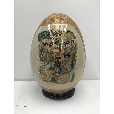 Japanese Decorated Porcelain Egg On Stand