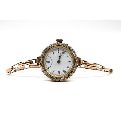 Art Deco 18ct Yellow and White Gold Watch with Diamond Bezel, Rotherhams London with 9ct Rolled Gold Band