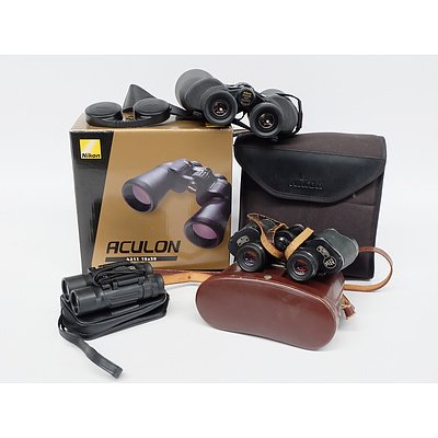 Three Pairs of Binoculars including: Carl Zeiss, Nikon Aculon and More