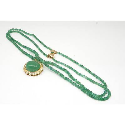 Impressive Gold and Diamond Set 50ct Emerald Cabochon Pendant on an Emerald Beaded Necklace