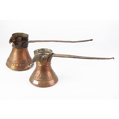 Two Middle Eastern Copper Coffee Pourers