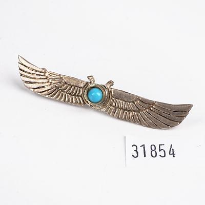Winged Silver Brooch with Inlaid Blue Glass