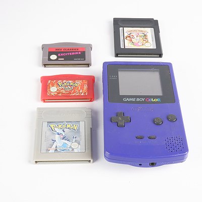 Vintage Nintendo Game Boy 'Colour' game Console with Four Game Cartridges including: Pokemon Silver, Pokemon FireRed and More