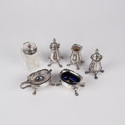 Eight Pieces of Silver Plate Including Two Salt Cellars with Spoons, Salt & Pepper Castors and More
