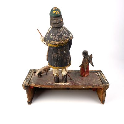 Antique Filipino Hand Carved and Painted Santos Figure of Saint Roch on his Pilgrimage Accompanied by an Angel and a Dog, Late 19th to Early 20th Century