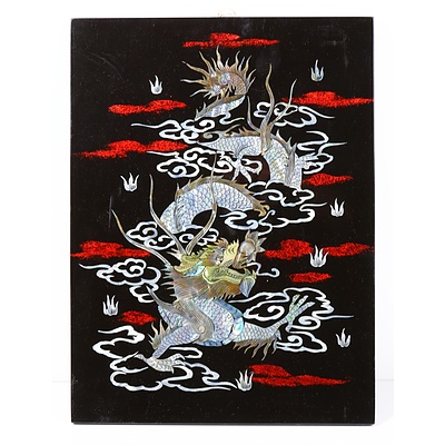 An Mother of Pearl Inlaid Depiction of a Dragon on Ebonised Board