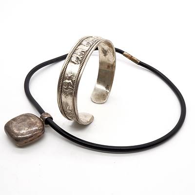 Sterling Silver Cushion Shaped Hollow Pendant on Rubber Chain and Sterling Cuff Bracelet