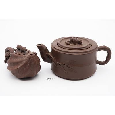 Two Chinese Yixing Pottery Teapots Including Fruit Shaped
