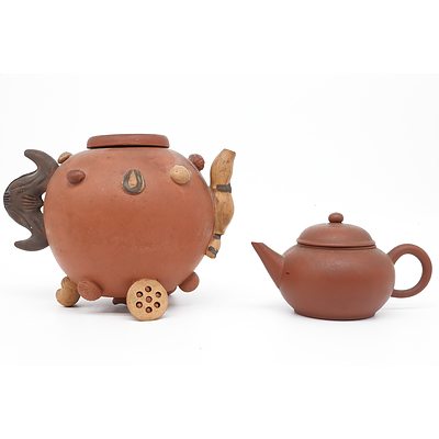 Two Chinese Yixing Teapots, Including an Early Fruit and Nut Teapot with Bat Handle, Late Qing or Later