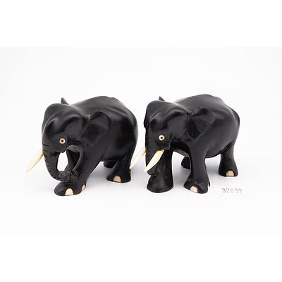 Pair of Small Carved Ebony and Bone Elephants, and a Simlilar Stand