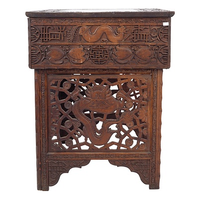 South Chinese or Burmese Teak Campaign Desk Profusely Carved with Dragons and Auspicious Symbols, Circa 1900