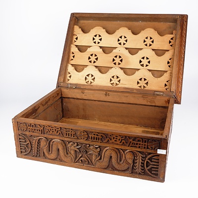 South Chinese or Burmese Teak Writing Box Profusely Carved with Dragons and Auspicious Symbols, Circa 1900