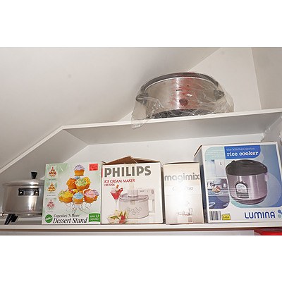 A Group of Electrical Kitchen Appliances Including a Philips Ice Cream Maker, Cooking Essentials Slow Cooker, Rice Cooker, Deep Fryer & Juicer