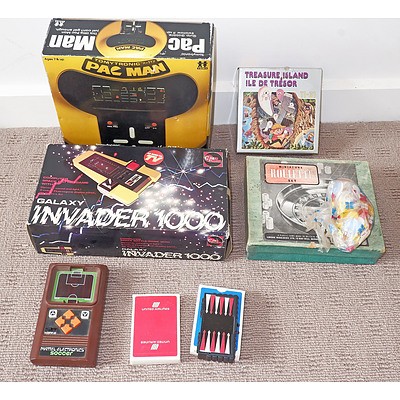 A Collection of Games Consoles including Galaxy Invader 1000 & Pacman Together with Assorted Other Games