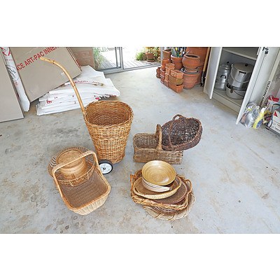 A Collection of Cane Baskets and Platters Including a Pull-Along Shopping Trolley and Chinese Food Steamer (12)