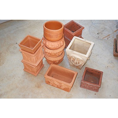 A Group of Terracotta Garden Planters with Various Decorative Motifs