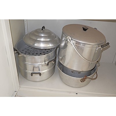 A Quanity of Large Preserving Cans Together with a Three Tiered Steamer