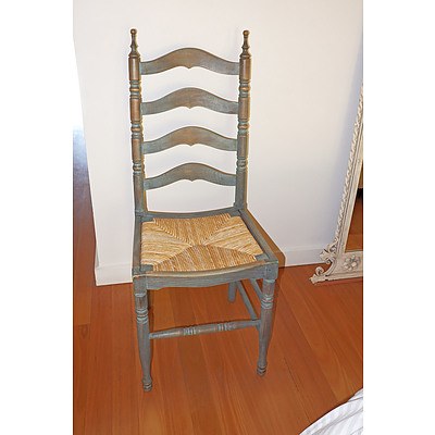 A Vintage Painted and Rush Seated Ladderback Chair