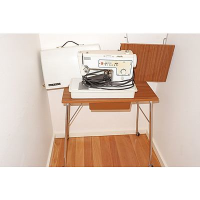 A Singer Stylist Model 413 Sewing Machine with Sewing Table