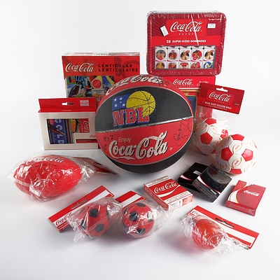 New Coca Cola Jigsaw Puzzles, Dominoes Set, Playing Cards, Six Balls and a Signed Canberra Cannons Coca Cola basketball