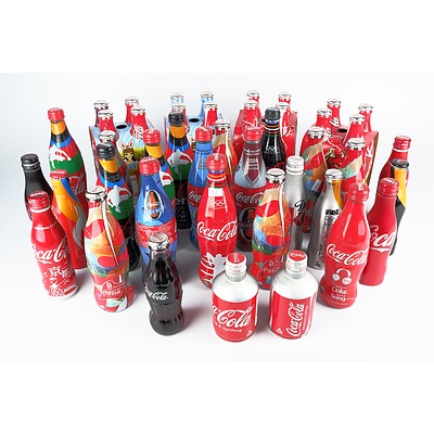 Large Collection of Assorted Unopened and Opened Coca Cola Collector Cans and Bottles (Approx. 80)