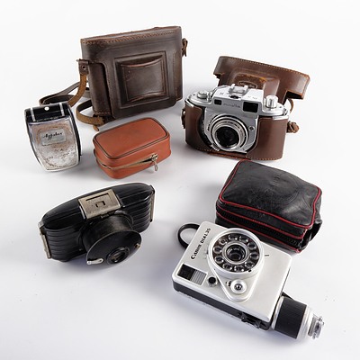 Minolta Optiper MX, Canon Dial 35, and Kodak Bullet Cameras with Accessories