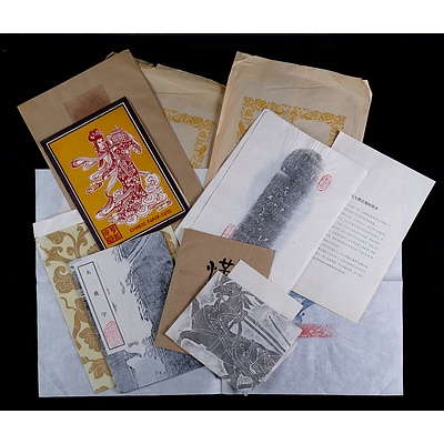 A Quantity of Unframed Chinese Papercuts, Woodblocks and Rubbings