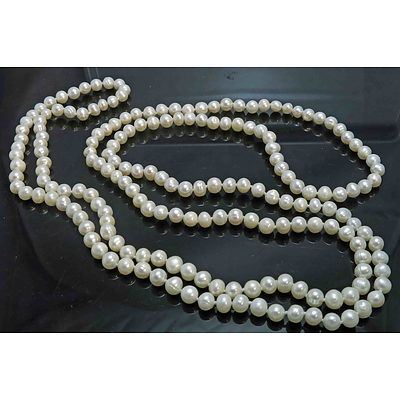 Extra Long (Triple) Strand Of White Cultured Pearls