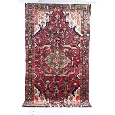 Persian Nahavad Hand Knotted Wool Pile Rug with Diamond Central Medallion and Floral and Bird Design on a Red Ground