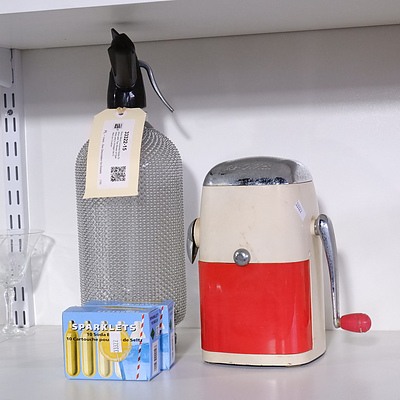 Retro Mesh Covered Soda Siphon with Two Boxes of Sparklets and a Vintage Ice-O-Mat ice Crusher