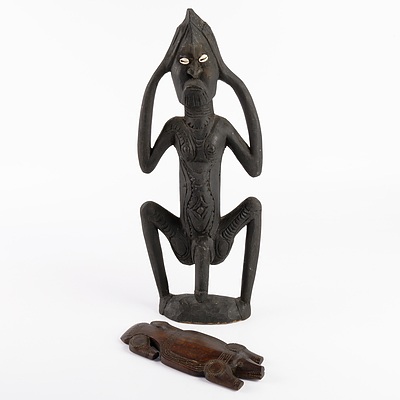 Pacific Island Fertility Figure with Shell Eyes and a Carved Crocodile Totem