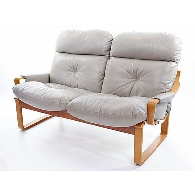 Tessa Two Seater Settee with Laminated Ply Frame and Beige Leather Upholstry