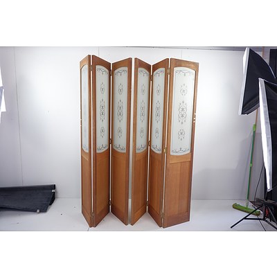 Two Sets of Tri-Fold Doors with Decorative Glass Panels