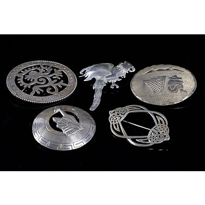 Four Various Mexican and South American Sterling Silver Brooches and a Celtic Brooch