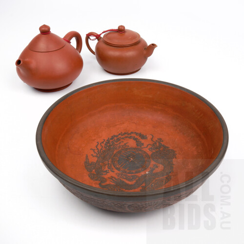 Two Chinese Yixing Pottery Teapots and a Dish Moulded with Dragons