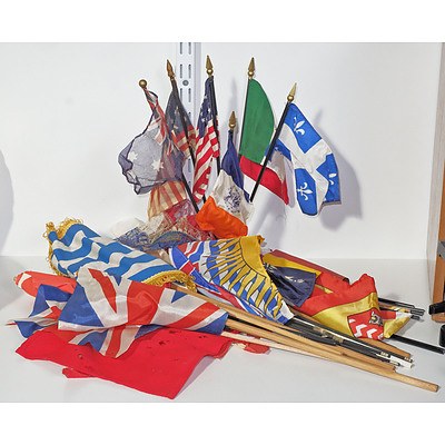 A Collection of Vintage Hand Held World Flags