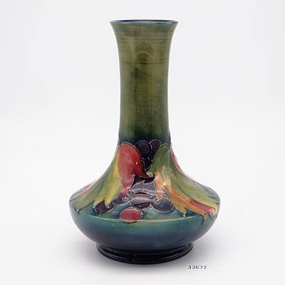 William Moorcroft Vase Painted in the Leaf and Berry Pattern on a Green Ground Circa 1930